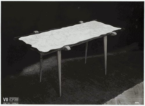 Image for VII Triennale - Mostra dei tessuti e dei ricami - Sezione dei merletti e dei ricami - Tavolo d'esposizione con il ricamo "Il suolo di Roma" di Laura Colarieti Tosti