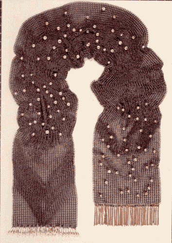 Image for Tra moda e design, linea infinita - Sciarpa in acciaio inox e oro di Giancarlo Montebello