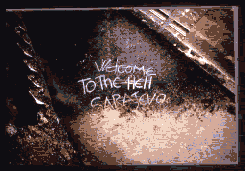 Image for XIX Triennale - Le partecipazioni internazionali - Città e società - Bosnia Erzegovina - Graffito nella Biblioteca Nazionale di Sarajevo