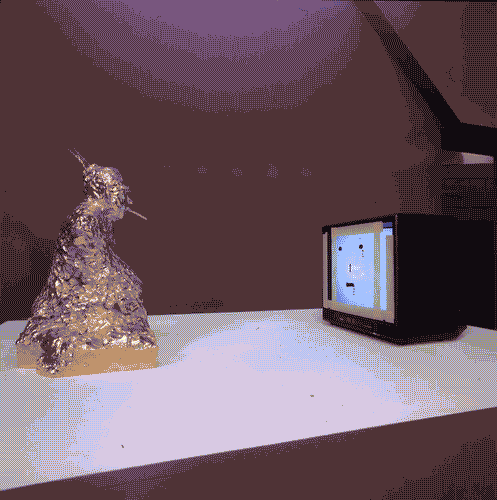 Image for XVII Triennale - Le città del mondo e il futuro delle metropoli - Oltre la città la metropoli - sezione Arte (produzione artistica e comportamenti culturali) - "TV Buddha" di Nam June Paik